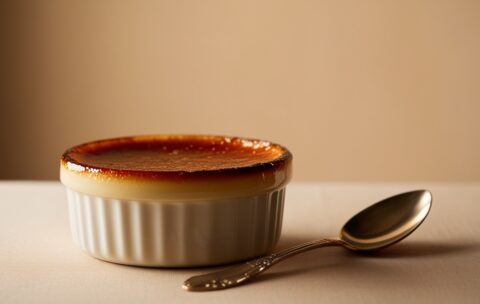 Leonardo_Phoenix_09_A_luxurious_still_life_of_crme_brle_set_ag_1