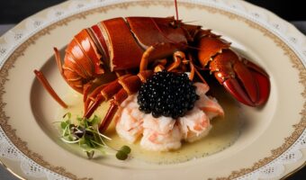 Leonardo_Phoenix_09_A_succulent_goldenbrown_Crispy_Lobster_The_0